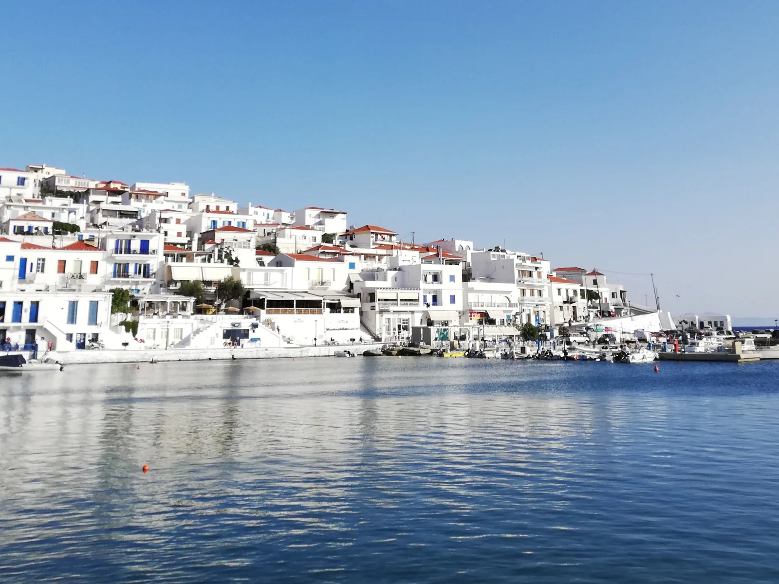 Batsi rising above its harbour on the west coast of Andros