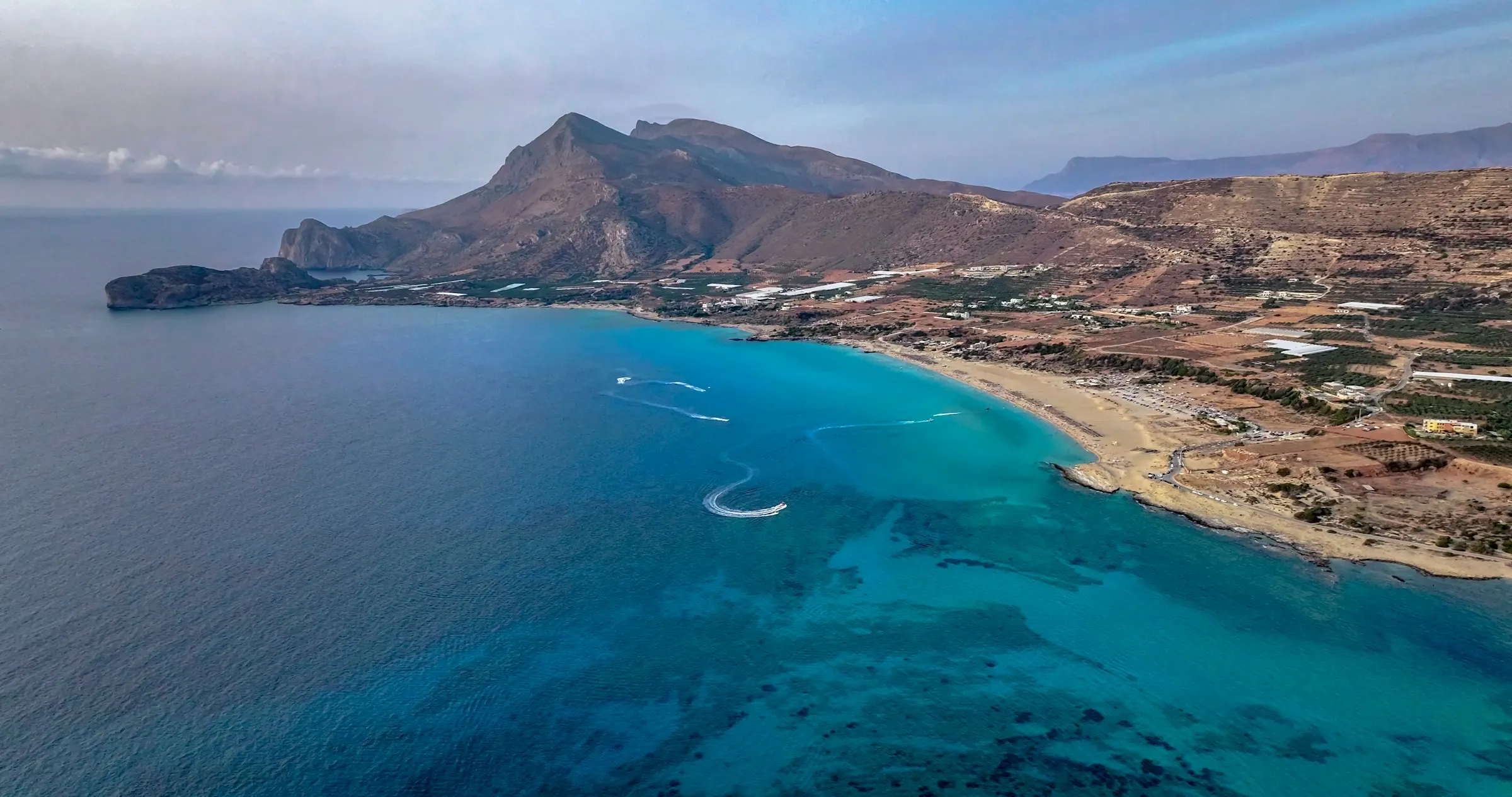 The long sandy sweep of Falassarna beach at the western end of Crete