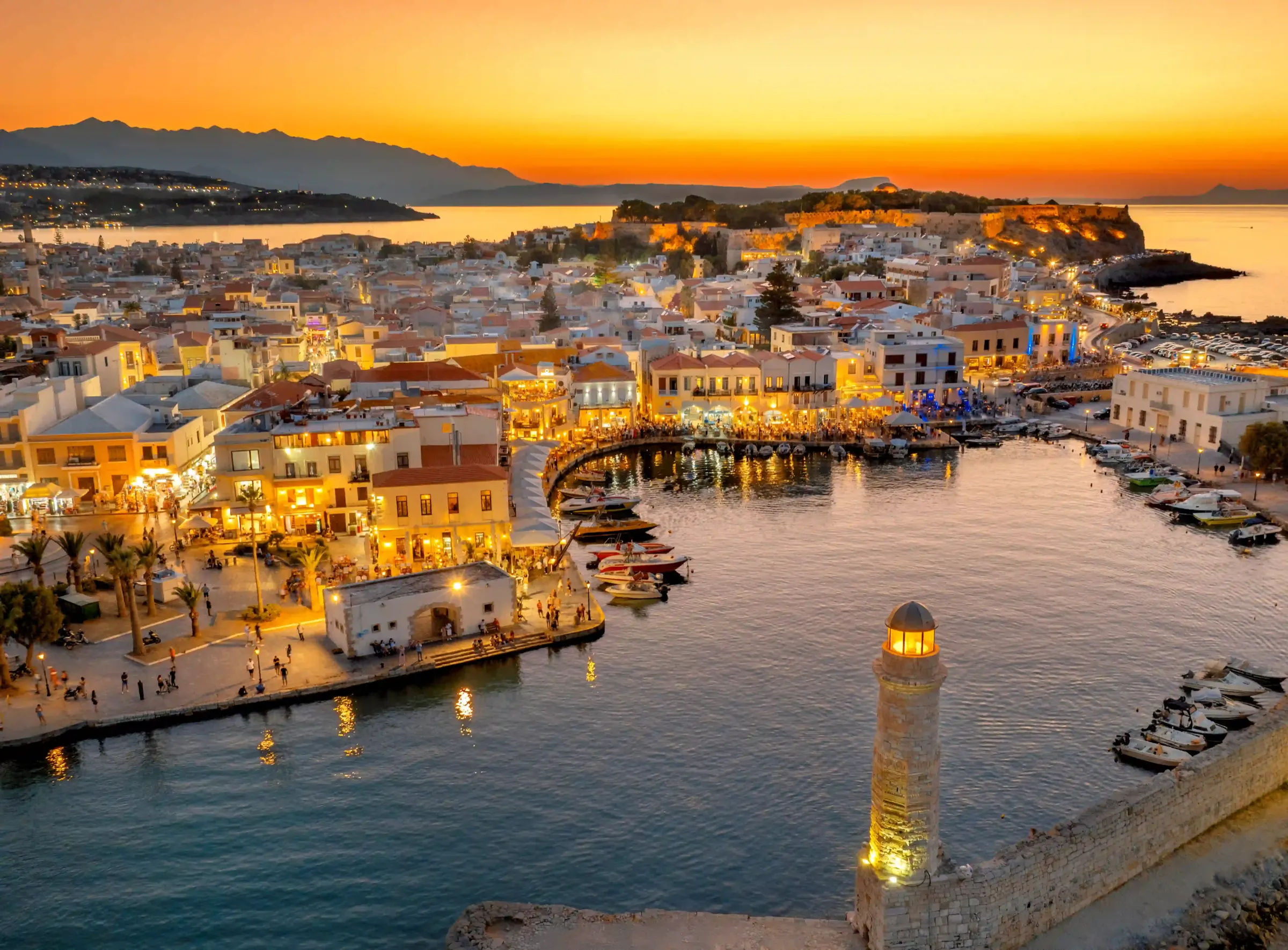 Rethymno's Venetian harbour and lighthouse beneath the Fortezza