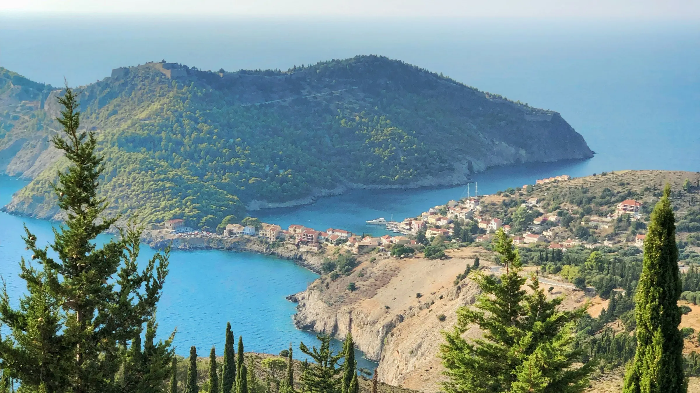 Assos village on its narrow peninsula below the Venetian fortress