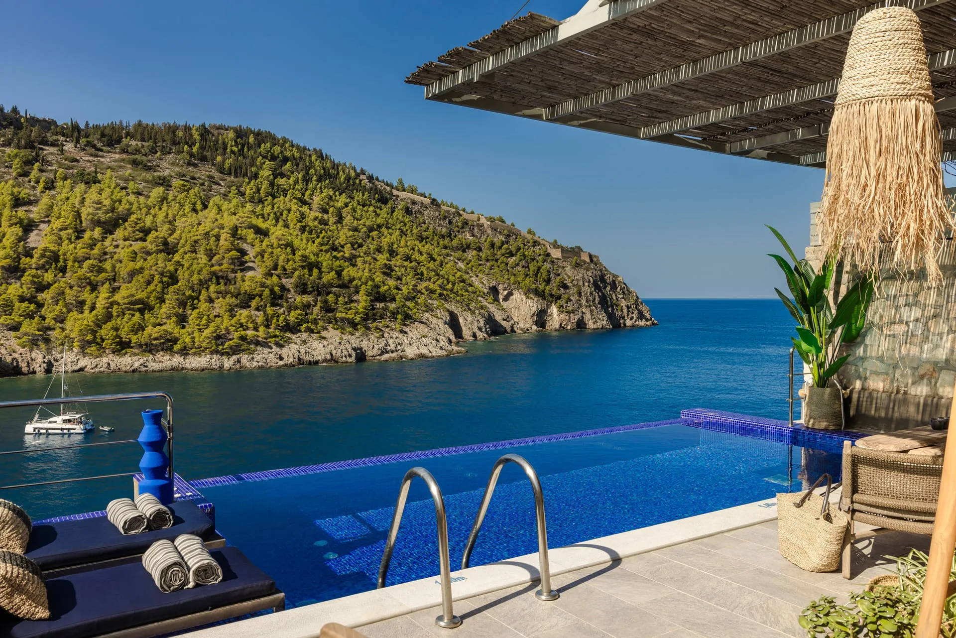 Deep blue tiled pool at Villa Eutixia beside the bay of Assos