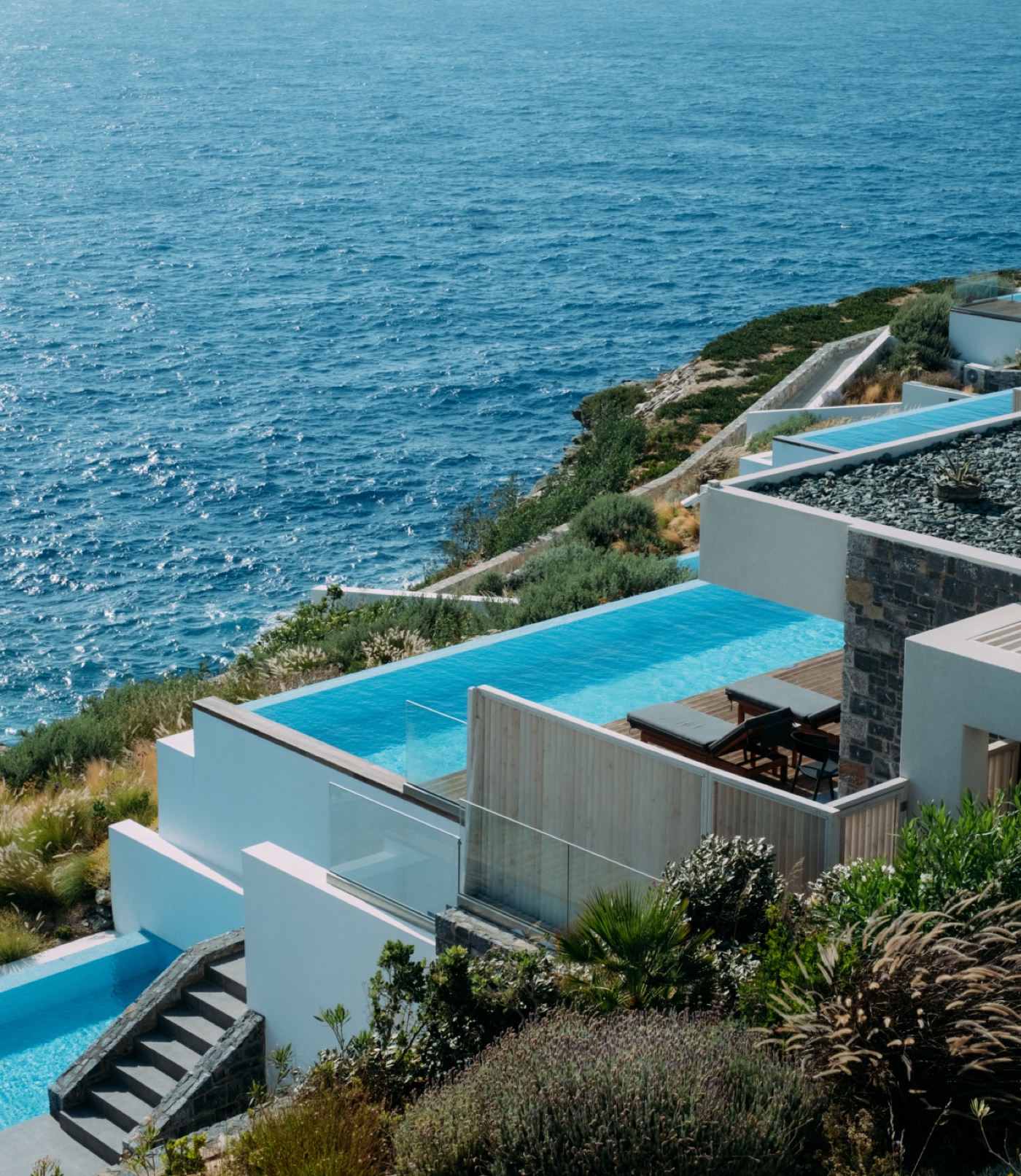 Villa Aroma terraces and private pools descending towards the Cretan Sea
