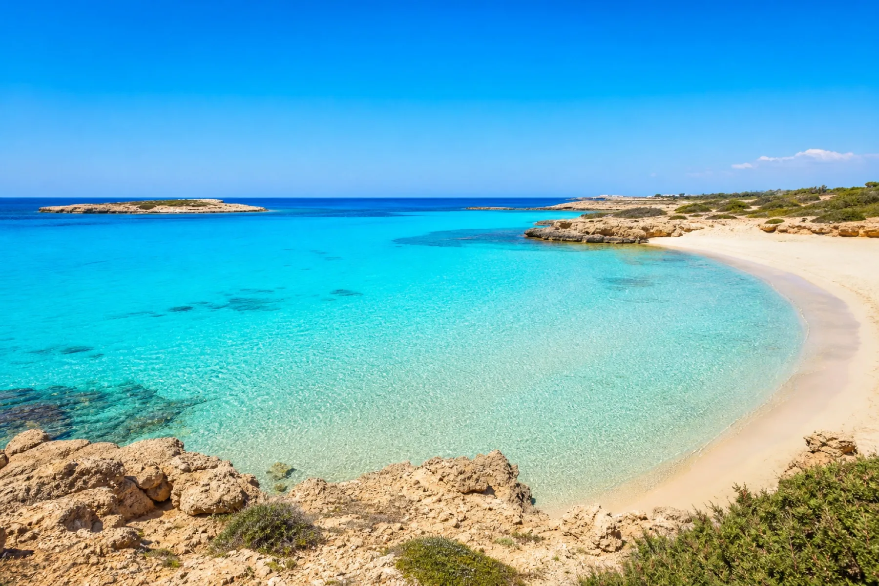 Makronissos Beach in Ayia Napa, Cyprus, with turquoise sheltered water