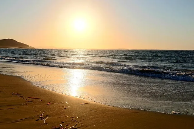 Sunset over a quiet sandy beach on Naxos