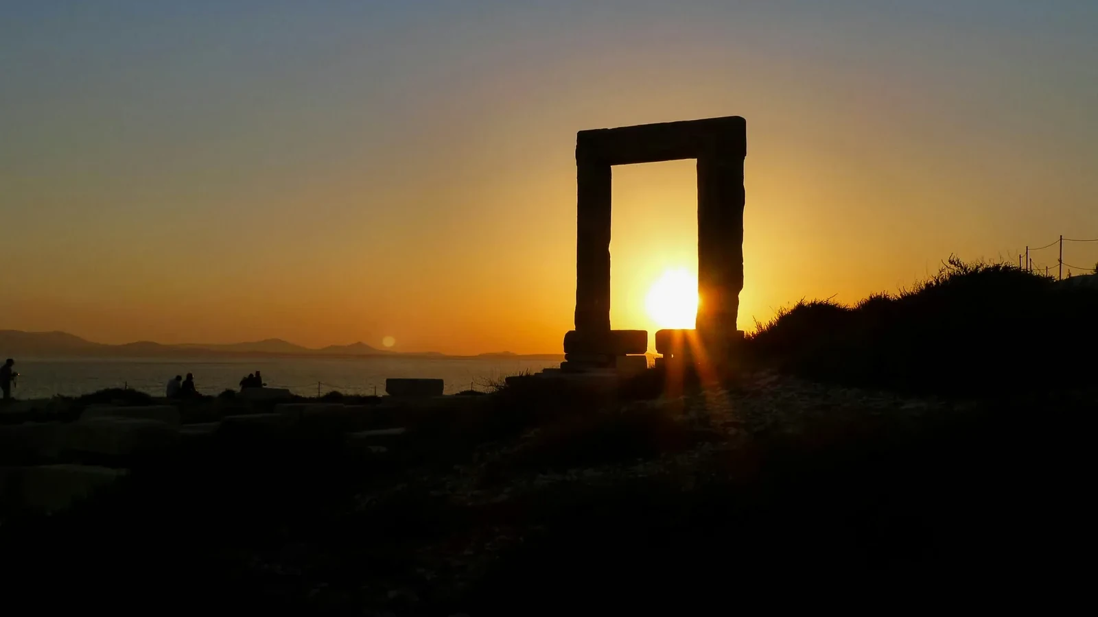 The Portara at sunset on the edge of Naxos Town