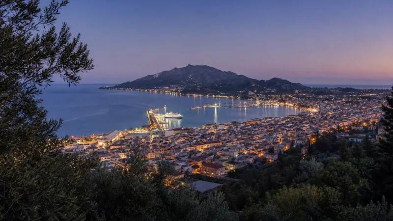 Zakynthos Town and its harbour seen from Bohali at blue hour